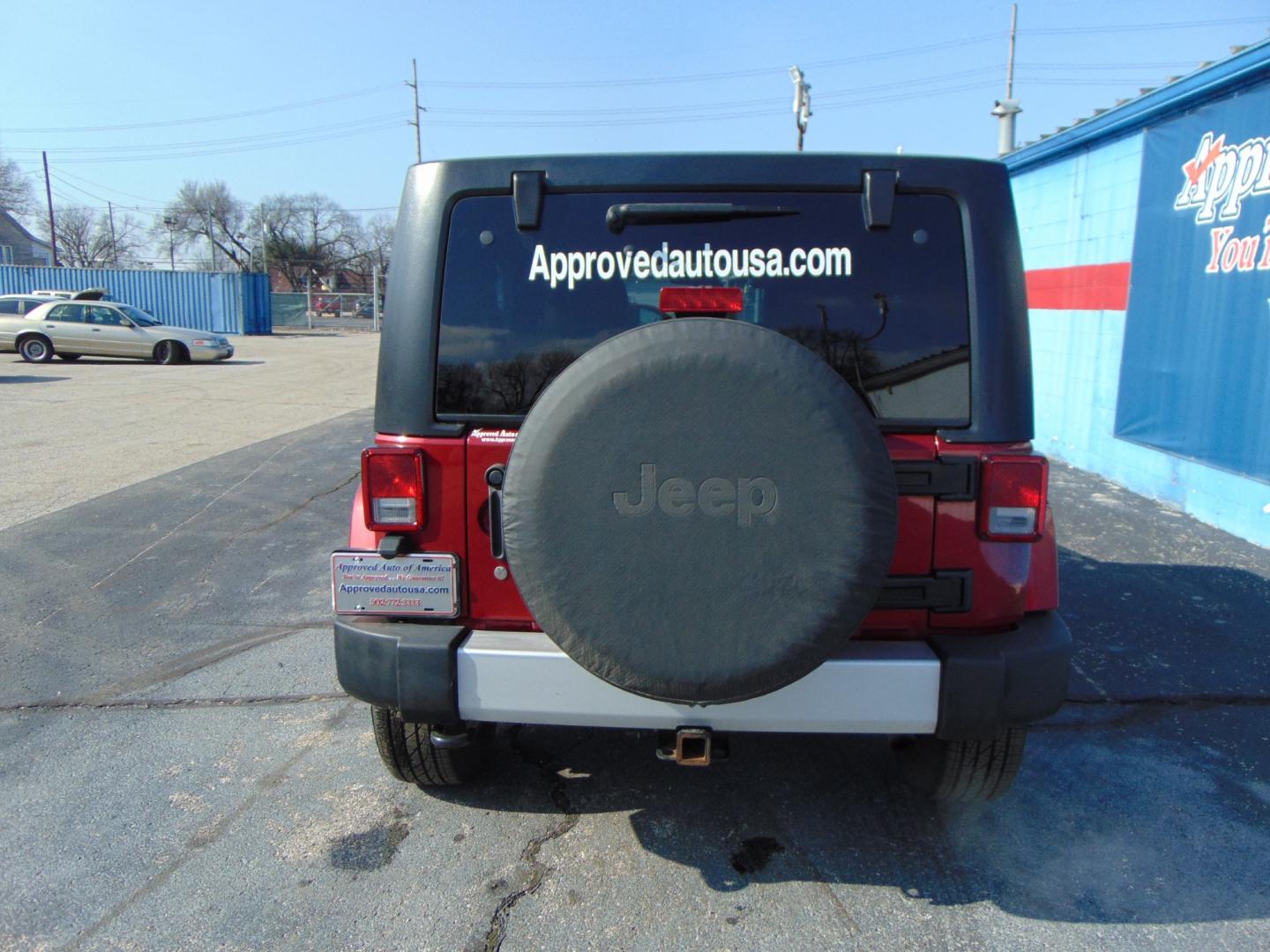 2012 BURGUNDY Jeep Wrangler (1C4HJWEG4CL) with an V6 3.6 Liter engine, Automatic, 5-Spd transmission, located at 2105 Dixie Hwy, Louisville, KY, 40210, (502) 772-3333, 38.220932, -85.795441 - Photo#11